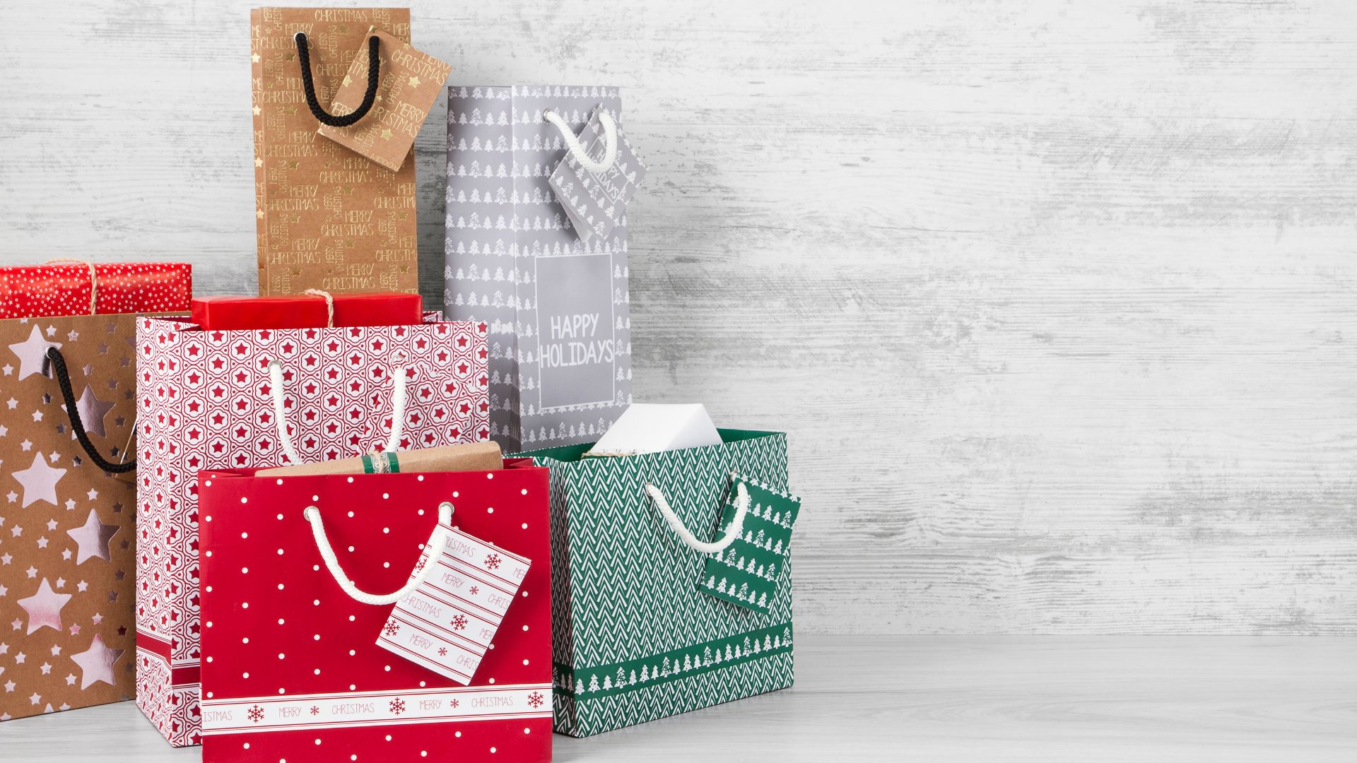 Blagdani za pamćenje uz vrećice s božićnim tiskom: Poželite klijentima najljepše želje